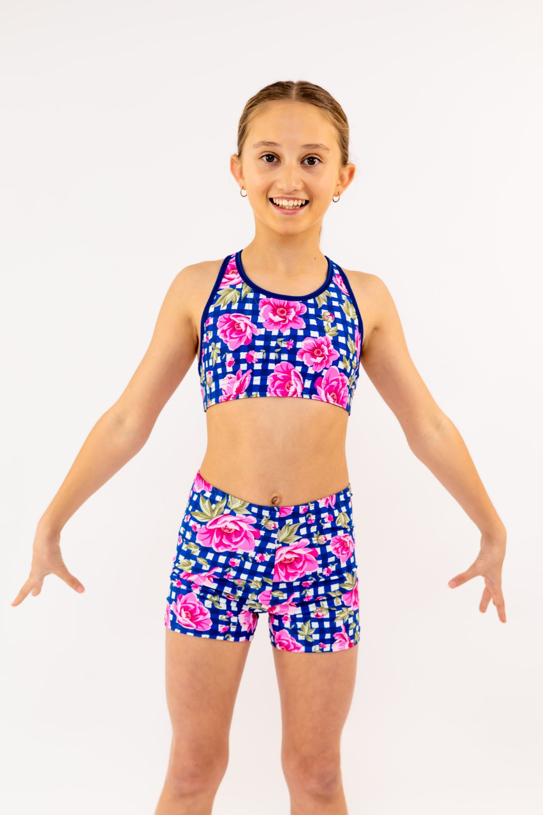 Navy Gingham Check Pink Flower Bike Shorts, Bike Pants with Gold Logo. Girls Activewear, Girls Gymnastics Wear, Girls Swimwear, Gymnastics Leotard, Dance Leotard, Booty Shorts, Crop top Set, Two Piece Set, Matching Leotard and Shorts, Bicycle Shorts, Gymnastics Australia, USA Gymnastics, Girls Leggings, Girls Tights, Girls Shorts. Coloured Bike Shorts. Gymnastics Shorts. Floral