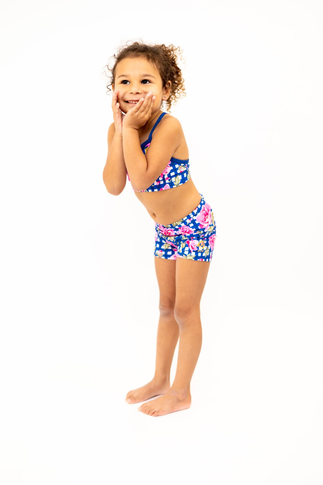 Navy Gingham Check Pink Flower Bike Shorts, Bike Pants with Gold Logo. Girls Activewear, Girls Gymnastics Wear, Girls Swimwear, Gymnastics Leotard, Dance Leotard, Booty Shorts, Crop top Set, Two Piece Set, Matching Leotard and Shorts, Bicycle Shorts, Gymnastics Australia, USA Gymnastics, Girls Leggings, Girls Tights, Girls Shorts. Coloured Bike Shorts. Gymnastics Shorts. Floral
