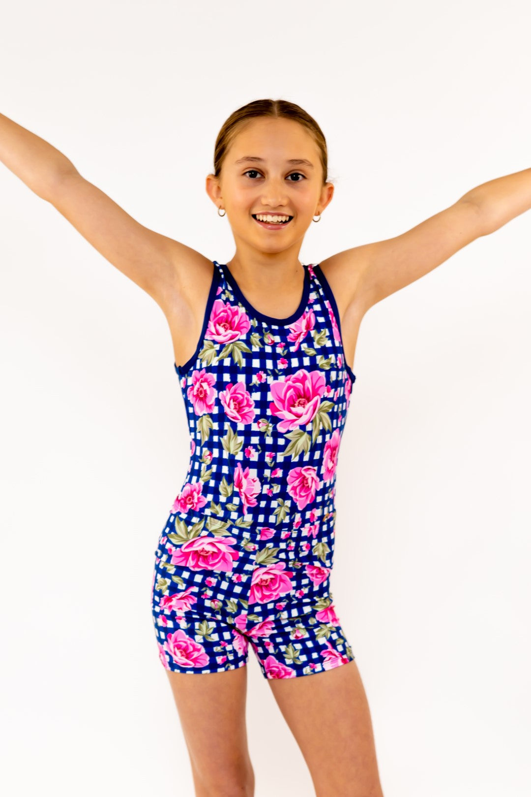 Navy Gingham Check Pink Flower Bike Shorts, Bike Pants with Gold Logo. Girls Activewear, Girls Gymnastics Wear, Girls Swimwear, Gymnastics Leotard, Dance Leotard, Booty Shorts, Crop top Set, Two Piece Set, Matching Leotard and Shorts, Bicycle Shorts, Gymnastics Australia, USA Gymnastics, Girls Leggings, Girls Tights, Girls Shorts. Coloured Bike Shorts. Gymnastics Shorts. Floral