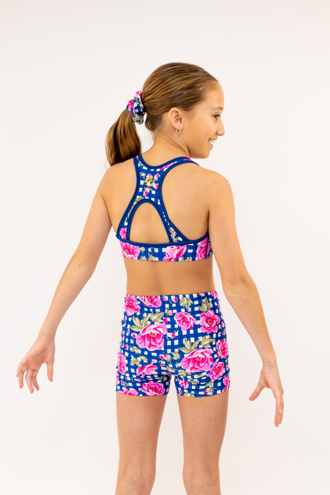 Racerback Navy Gingham Check Sports Bra, Crop Top. Girls Activewear, Girls Gymnastics Wear, Girls Swimwear, Gymnastics Leotard, Dance Leotard, Crop top Set, Gymnastics Two Piece Set, Matching Leotard and Shorts, Gymnastics Australia, USA Gymnastics. Kids Swimwear Australia. Girls Bikini Tops. Girls Bikinis. Sports Bikinis for girls. Swimsuit. Pink Flowers. Floral