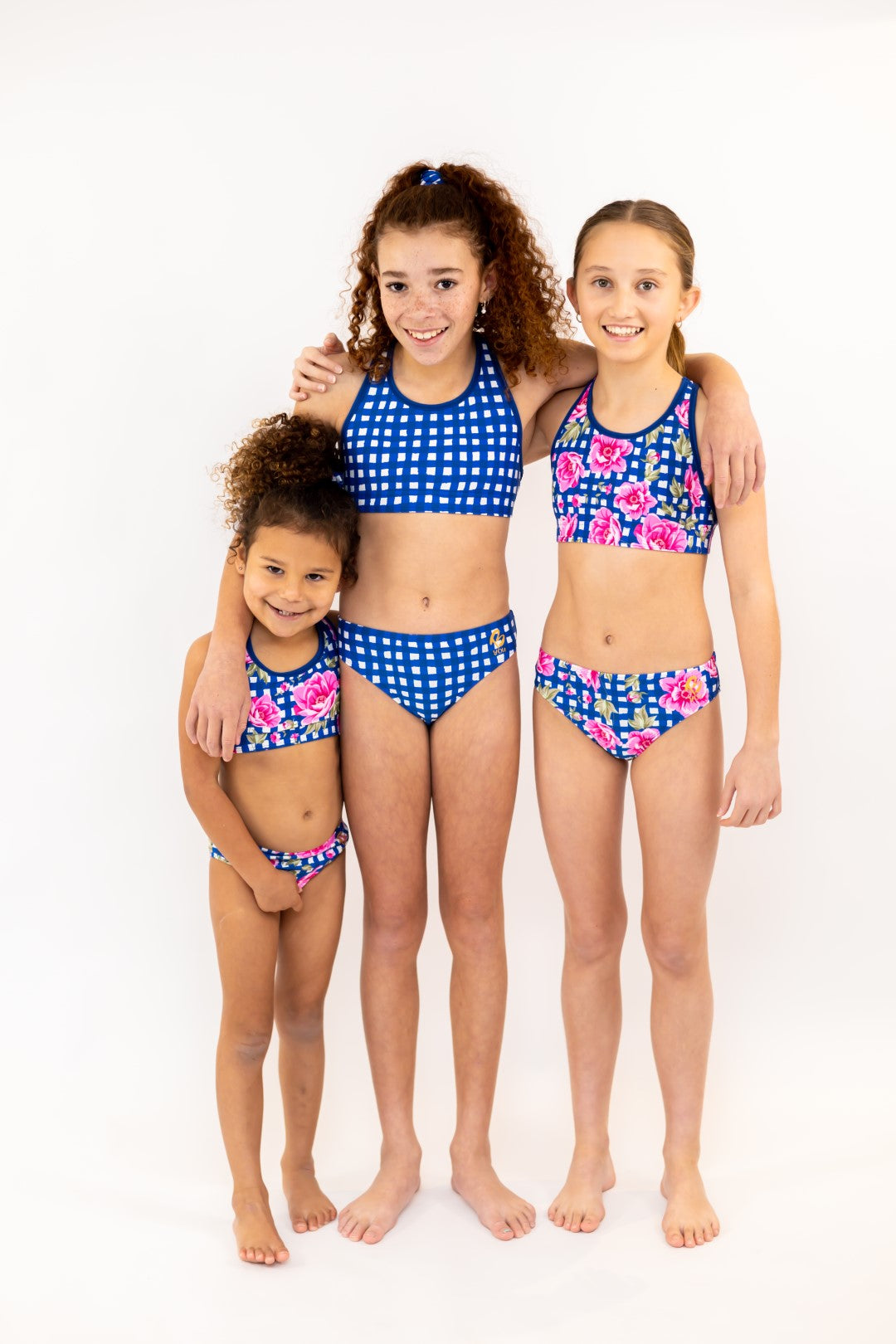 Racerback Navy Gingham Check Sports Bra, Crop Top. Girls Activewear, Girls Gymnastics Wear, Girls Swimwear, Gymnastics Leotard, Dance Leotard, Crop top Set, Gymnastics Two Piece Set, Matching Leotard and Shorts, Gymnastics Australia, USA Gymnastics. Kids Swimwear Australia. Girls Bikini Tops. Girls Bikinis. Sports Bikinis for girls. Swimsuit. Pink Flowers. Floral