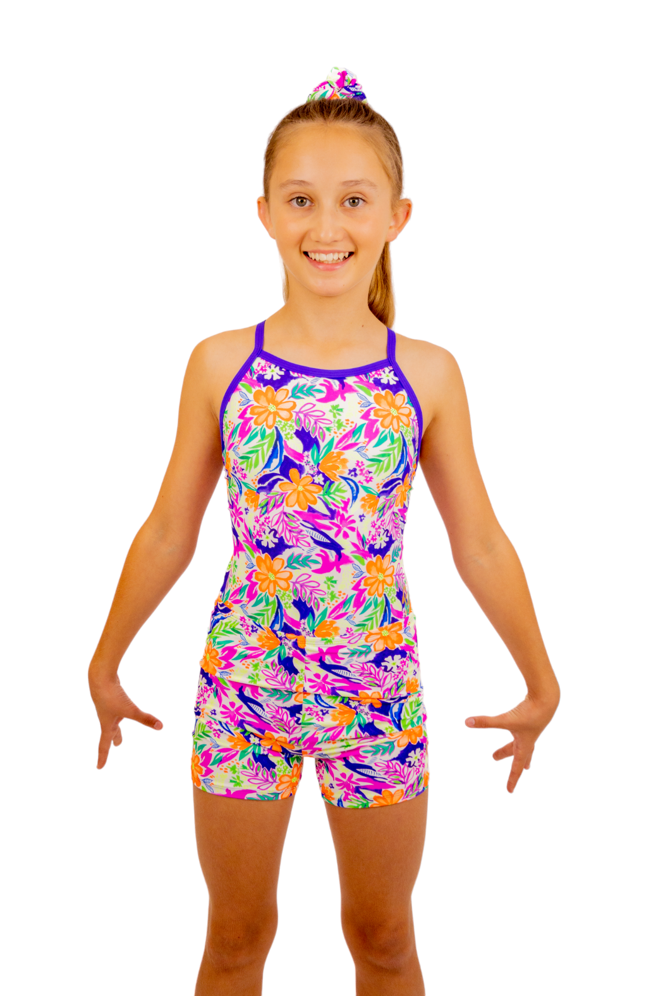 Bright Coloured Tropical Print One Piece Leotard or Swimsuit for Girls. Gymnastics Leotard, Girls Swimwear, Strappy Back, Racer Back, Tank Style, Thin Straps all Available. Fluorescent Purple, green, Yellow, Orange Flowers. Matching Scrunchie and Bike Shorts. B you Active, B you Leotards, B you Swimwear.