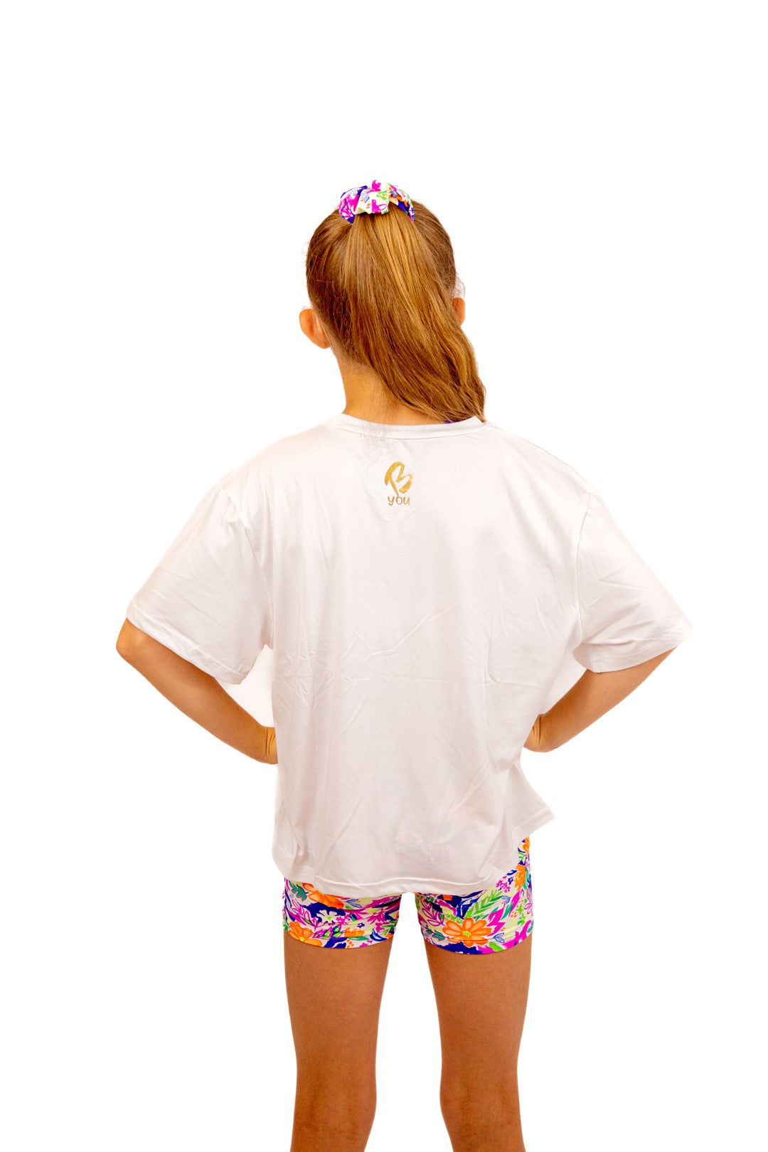 Soft Cropped White T Shirt for Girls. Tropical Print with B you Logo on a White Background. Activewear for Girls, Gymnastics wear, girls clothing, leotards. Girls Sports Clothing. B you Active, B you leotards, B you Swimwear.