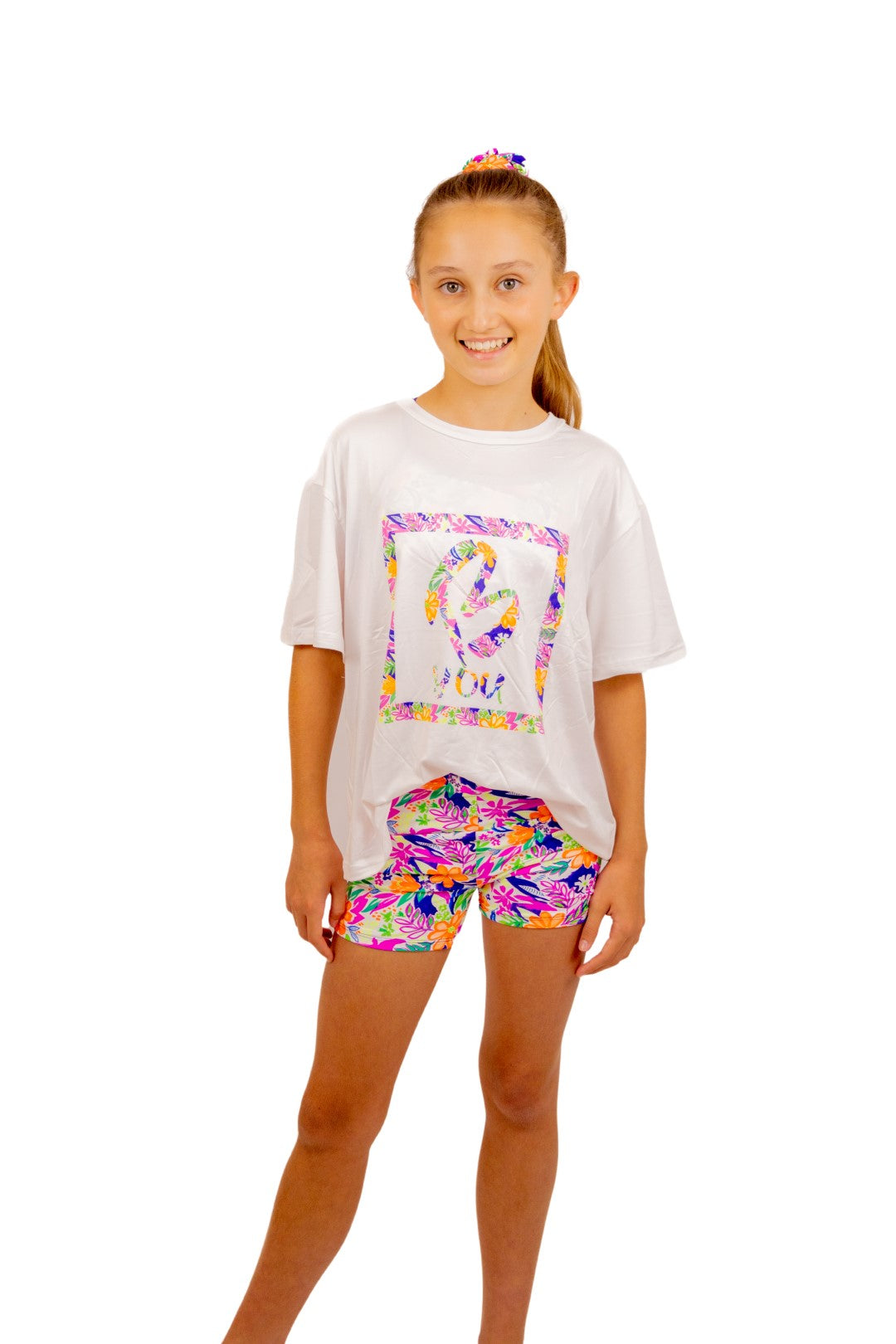 Soft Cropped White T Shirt for Girls. Tropical Print with B you Logo on a White Background. Activewear for Girls, Gymnastics wear, girls clothing, leotards. Girls Sports Clothing. B you Active, B you leotards, B you Swimwear.