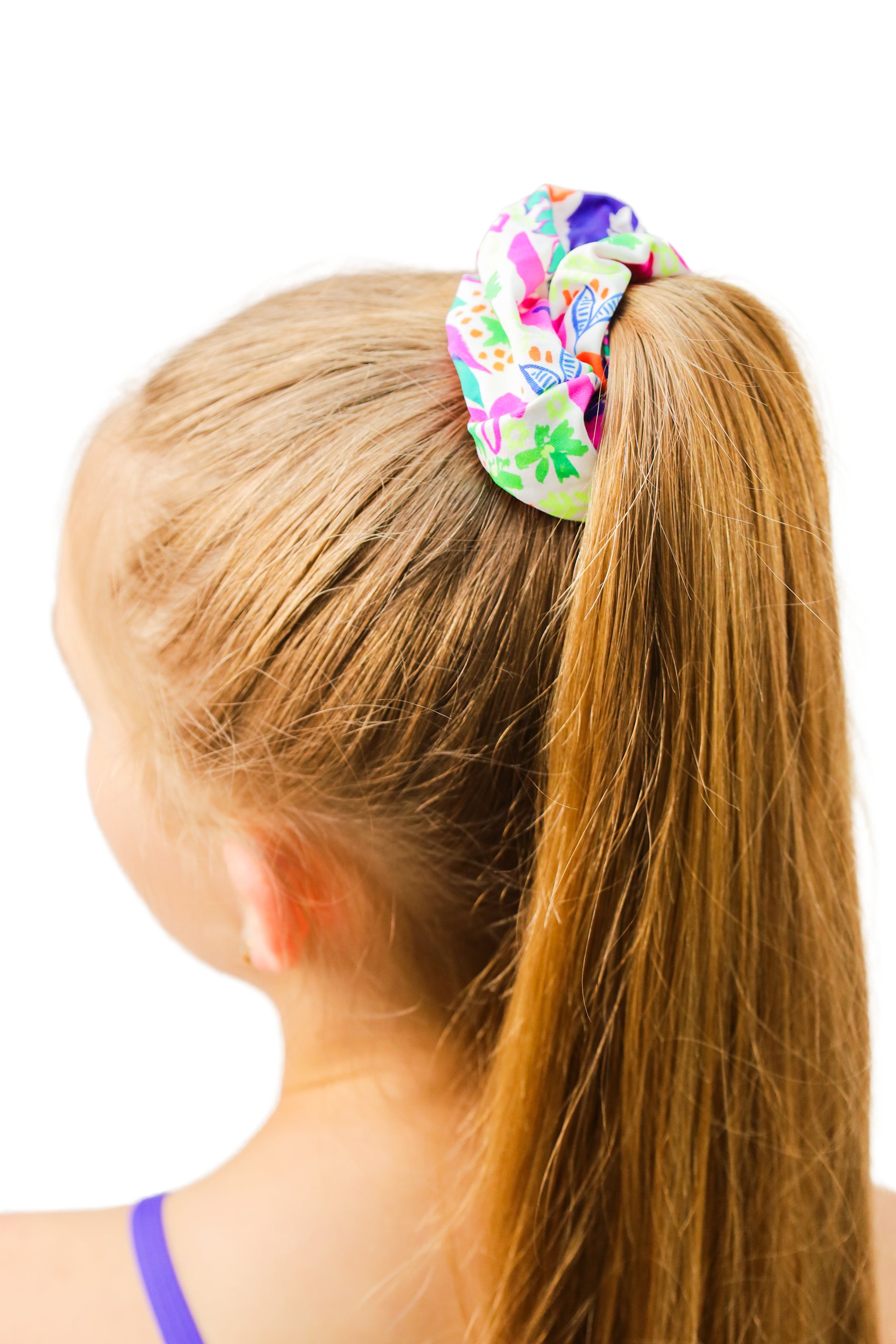 Tropical Scrunchie in fluorescent print. B you active. B you leotards. B you swimwear. Girls Swimwear. Bikinis. Kids clothing. Girls Activewear, Gymnastics Wear, 2 piece crop top sets. Leotards, Dancewear, Sporty Girls