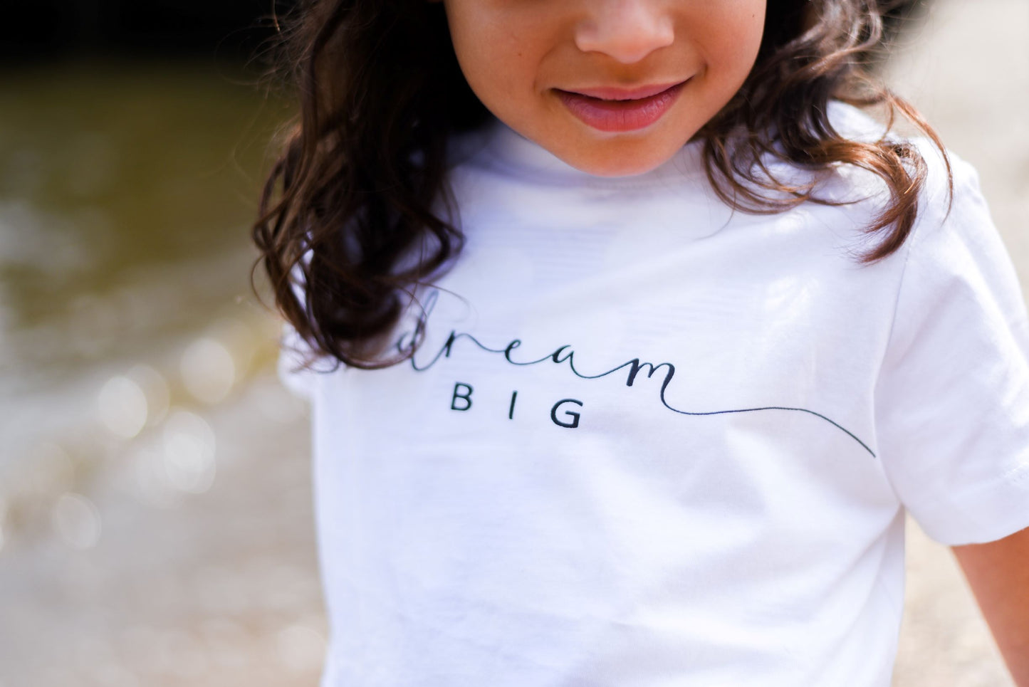 White Cropped T shirt with black writing Dream Big Gymnastics Leotard Australia, USA, UK, NZ